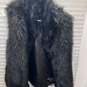 Black faux fur vest